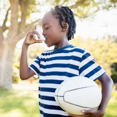 boy using inhaler