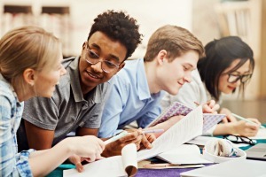 Group of teens working together.