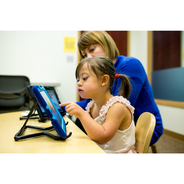 child with Down syndrome using tablet