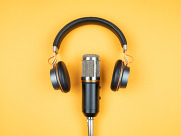 photo of headphones and a microphone