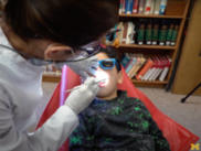 photo of a dentist with patient