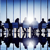 NACMHD: Group of people around a conference table