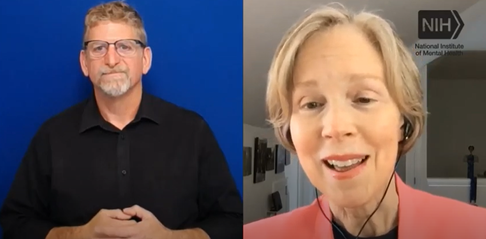 NIMH grantee Dr. Cynthia Bulik and a male American Sign Language interpreter during an event on eating disorders.