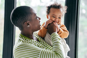 Photo of a woman holding a baby