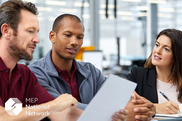 people looking at a strategic plan