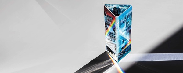 Prism with manufacturing images inclosed within