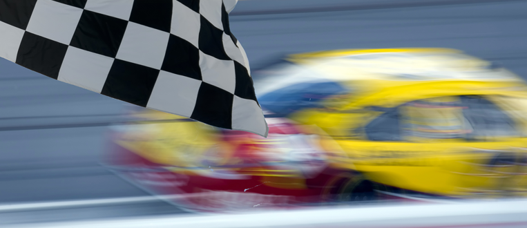 race car with checkered flag