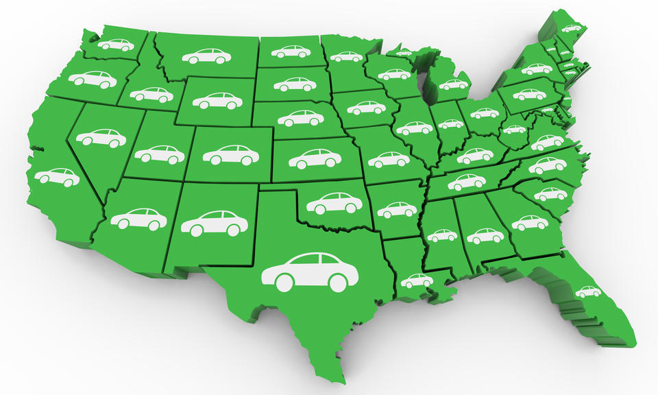 green map of the united states with a car symbol in each state