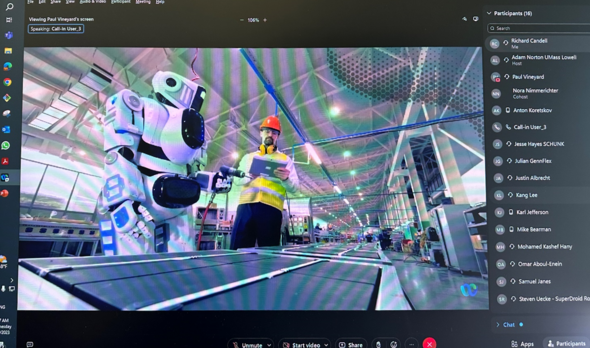 Presentation image of robot and human in manufacturing facility