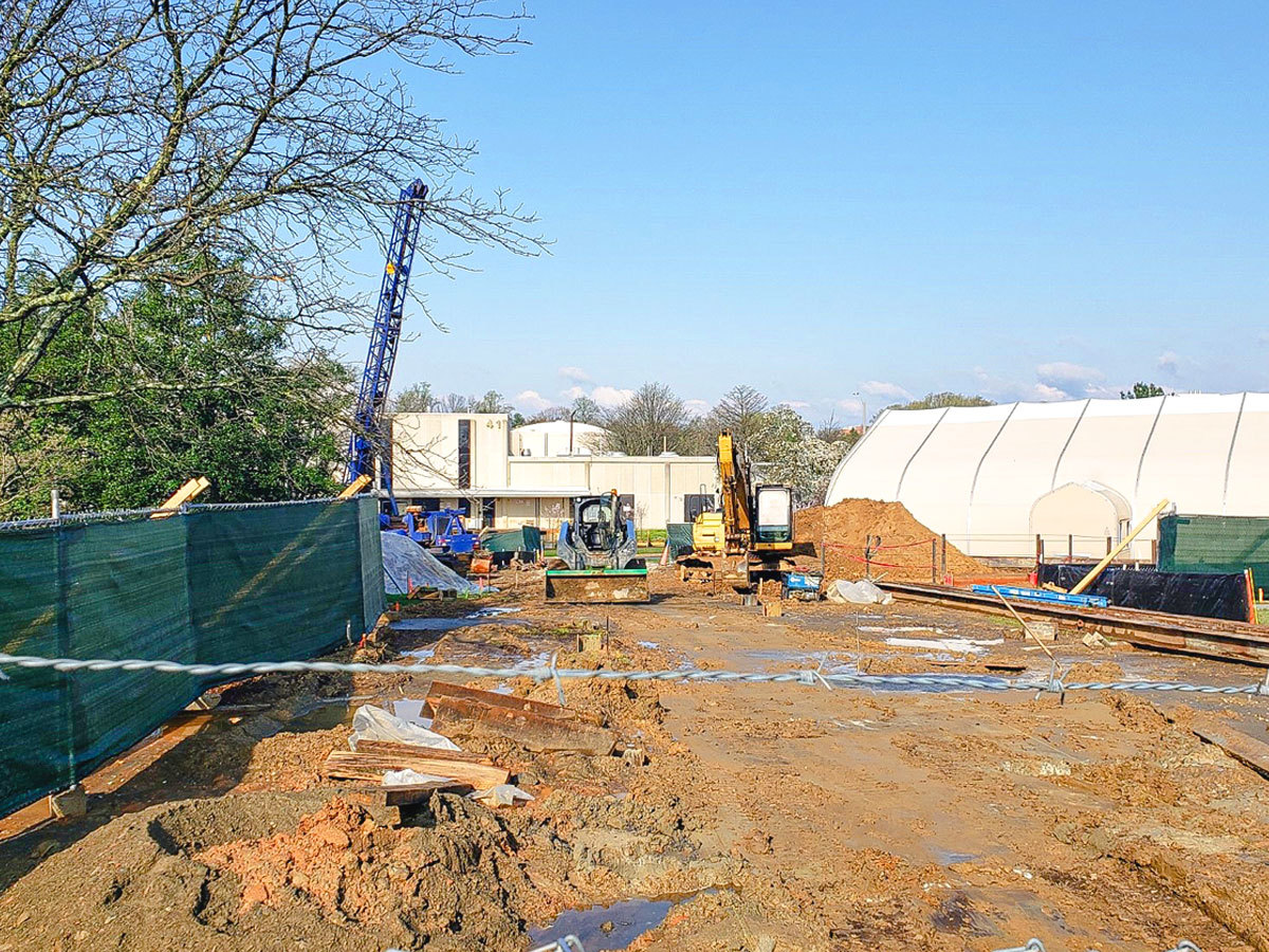 Photo is of the NLM power utility building under construction.