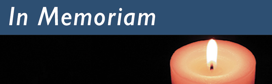 In Memoriam header with single lit candle