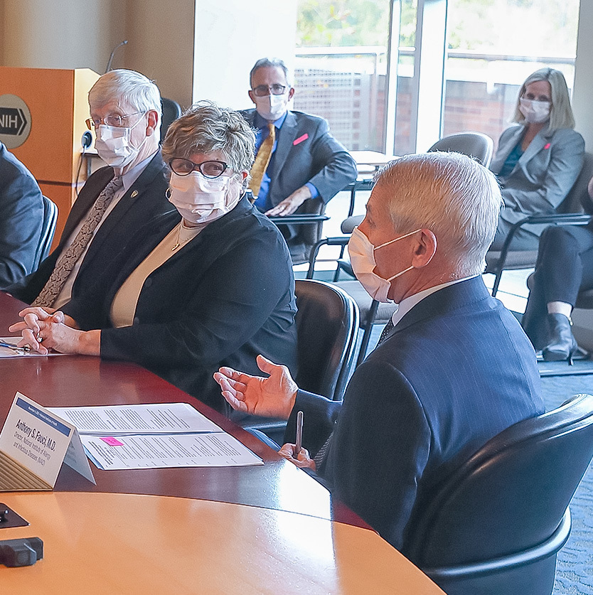 Dr. Patti Brennan talking to Anthony Fauci during HHS Secretary visit to NIH.