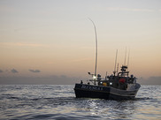 A fishing boat equipped with "greenstick gear" in the Gulf of Mexico. © Jay Fleming Photography/NFWF