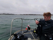 LTJG Alex Creed participates in a dive with the U.S. Coast Guard, NOAA Fisheries