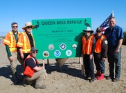 Mel Landry (third from left) joined federal and state trustee partners at an event dedicating the newly restored Queen Bess Island in Louisiana.