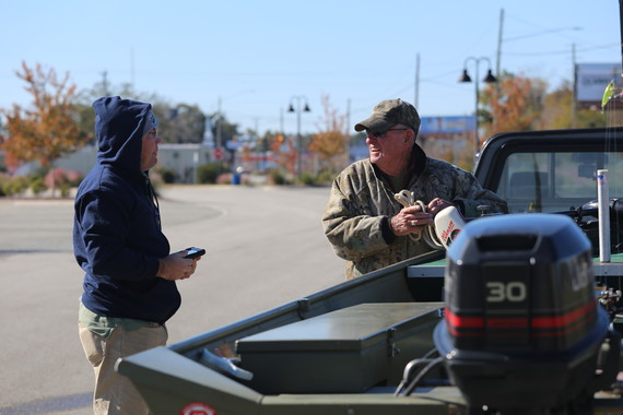 A field interviewer surveys an angler in Jacksonville, North Carolina.