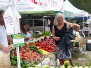 Janet Coit visits a farmer’s market—one of her favorite activities.