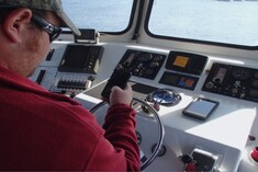 A captain using the logbook app on a mobile device.