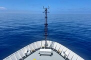 The view of the bow of NOAA Ship Gordon Gunter on a beautiful day with blue water. Credit: NOAA Fisheries/Ellie Hartman