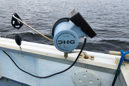 jigging gear attached to the rail of a boat