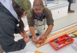 Measuring a rockfish caught by a recreational angler.