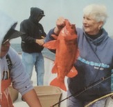 Marcy Dorflinger holds a vermilion rockfish while fishing. Photo courtesy of Marcy Dorflinger.