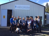 PSRF staff pose for a photo with Kenneth K. Chew’s family and friends in front of the Kenneth K. Chew Research Center