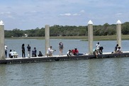 Children fishing on a dock in Charleston, South Carolina. Credit: Jae Schmitz.