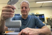 NOAA Fisheries fish biologist Donald Van Doornik processing salmon genetic samples.