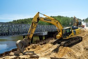 Excavators on the Chequessett Neck Dike over the Herring River. Credit: Molly Feltner/NOAA.