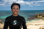 Kuleana COAST participant Honuʻāina Nichols gets suited up for a coral restoration training dive on Oʻahu. Credit: Molly Feltner/NOAA