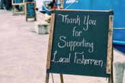 A signboard thanking patrons at Tuna Harbor Dockside Market in San Diego. Credit: Tuna Harbor Dockside Market.