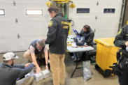 NOAA enforcement staff and Florida International University scientist perform the first field test of a field forensic device.