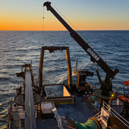 The back deck of a NOAA research vessel at sea.