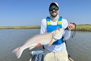 David Reeves, project manager and a lifelong Gulf Coast fisherman, holds a freshly caught red drum. Credit: David Reeves, NOAA