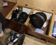 Hidden compartment on board vessel