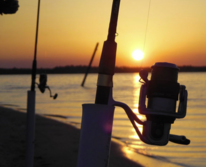 Rod and reel at sunset