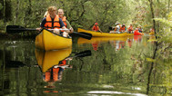 teachers in canoe outdoors