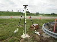 GPS receiver on a fixed-height tripod