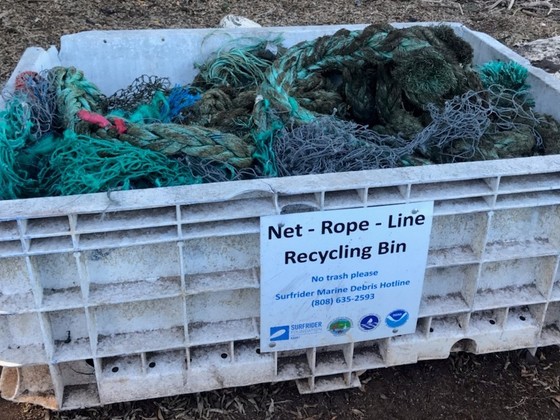 A net bin filled with heavy ropes and nets. 