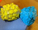 Blue and yellow star corals made from upcycled materials.