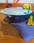 The base of the reef, made from a blue paper plate and cardboard box.