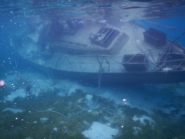 A derelict vessel in the Christiansted Harbor prior to removal (Credit: Kitty Edwards).