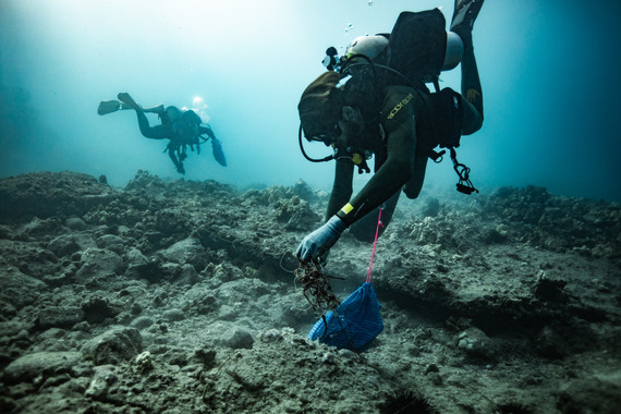 A diver cleans up marine debris.