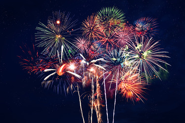 Colorful fireworks exploding in the sky.