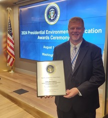 Presidential Environmental Awardee John Herrington