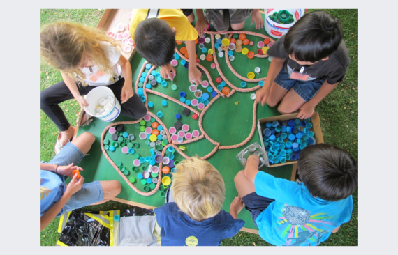 students work on an art project. 