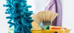 Mop head and cleaning brush head in a bucket