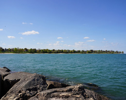 Giant rock boulders sit on the coast of Lake Michigan on the shore of Sheboygan, Wisconsin.