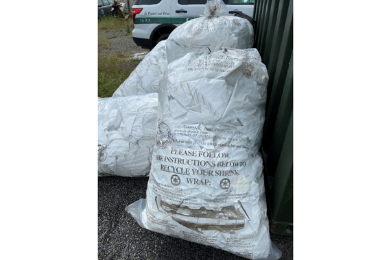 Plastic bags full of boat shrink wrap